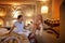 A couple man and woman drinking wine in the old cave room of Cappadocia