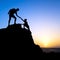 Couple, Man and woman help silhouette in mountains