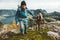 Couple man and woman holding hands travelers hiking