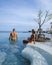 couple man and woman on a luxury vacation enjoying the infinity pool on the rooftop, Pattaya Thailand.