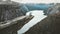 Couple Man and Woman on Trolltunga cliff mountains