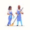 Couple man woman in uniform cleaning service concept african american cleaners holding mop and spray plastic bottle