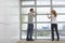 Couple Measuring Apartment Window