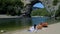 couple men and woman visiting famous natural bridge Pont d\'Arc in Ardeche France Ardeche