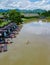 Couple men and women kayaking in the River Kwai Thailand