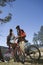 Couple With Mountain Bikes In Recreation Area