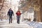 Couple of mountaineers hiking on winter