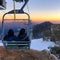 A couple on Mt Buller chair lift