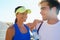 Couple, outdoor and athlete with water, workout and fitness with smile, training and sunrise for run. Man, woman and