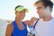 Couple, outdoor and runners with water, workout and fitness with smile, training and sunrise for run. Man, woman and