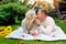 Couple outdoors enjoying a summery day looking happy