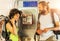 Couple on pay phone laughing