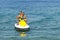 Couple people having fun with Jetski on open sea