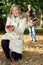 Couple picking chestnut.