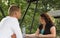 Couple at picnic table in a park