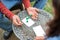 The Couple playing Yahtzee game in free time, outdor