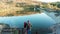 Couple on a pontoon bridge in a vacation in rural area