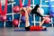 Couple practicing acro yoga in a studio. Acro yoga concept.