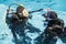 Couple practicing scuba diving together