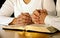 Couple Praying with Holy Bible