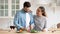 Couple prepare romantic dinner talking enjoy dating in the kitchen