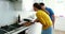 Couple preparing cookies in the kitchen