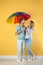 Couple with rainbow umbrella