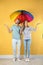 Couple with rainbow umbrella