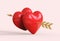Couple red hearts pierced by Cupid`s golden arrow in realistic 3d rendering, valentine`s day concept