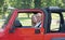 Couple in Red Jeep