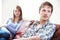 Couple With Relationship Difficulties Sitting On Sofa