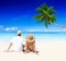 Couple Relaxing on the Beach Honeymoon Vacation Concept