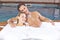 Couple relaxing in foam bath in whirlpool