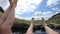 Couple relaxing in Hrunalaug natural hot spring, geothermal hot pot water, Iceland