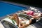 Couple relaxing on lounge chair at poolside