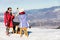 A couple is resting on lounges in picnic zone on european ski resort