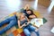 Couple resting lying on the carpet