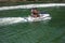 Couple riding a personal watercraft