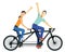 Couple riding tandem bike