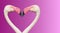 Couple of Rosy Chilean flamingos making loving heart at smooth gradient background