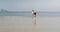 Couple Running On Beach Holding Hands Young Happy Tourists In Love On Vacation