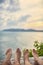 Couple\'s feet relax on top of mountain