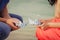 Couple`s hands with paper ships as a simbol of making a wish