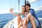 Couple on sailing boat taking selfie