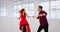 Couple, salsa and dance training in studio for competition or performance. Freedom, teamwork and creative man and woman