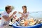 Couple in seafood restaurant making toast