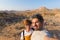 Couple selfie in the desert, Namib Naukluft National Park, Namibia road trip, travel destination in Africa.