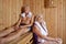 Couple of seniors on vacation in the sauna