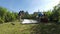 Couple setting up a camping tent in home garden.