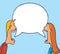 Couple sharing empty speech bubble having a conversation